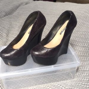 Size 5 black snake skin platform heels by halston